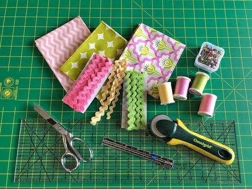 Scrap, Fat Quarter or ½ yard of 44"+ wide quilting weight cotton; we used Fat Quarters from our Sew4Home stash ½ yard of medium rick rack in a coordinating color to the napkin fabric; we used