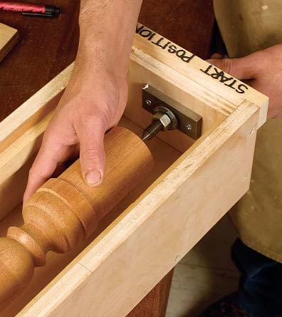 -thick plywood and modified off-the-shelf hardware, this jig is used to orient and support the column and guide the router when cutting the three dovetail slots for the legs. Wood screw 2-in.