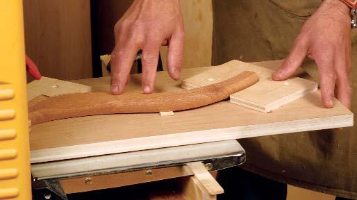To guide your progress, mark the leg with a centerline and two guidelines along the sides about from the edge. Glue the legs in the column.