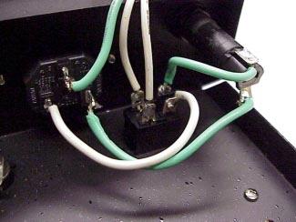 This is a closeup of the power wiring to the AC connector, fuse holder, and switch. This wiring follows the color convention given in the Graymark manual.