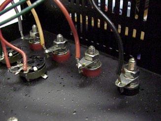 In AC wiring, black indicates a "hot" or "line" wire and "green" indicates ground. In general, green should never be used for a wire carrying AC power.