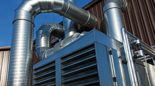 Reducing energy use Waste energy in the form of heat from production processes and compressed air generation via a bespoke new heat exchange system is used to provide 70% of the heating required for