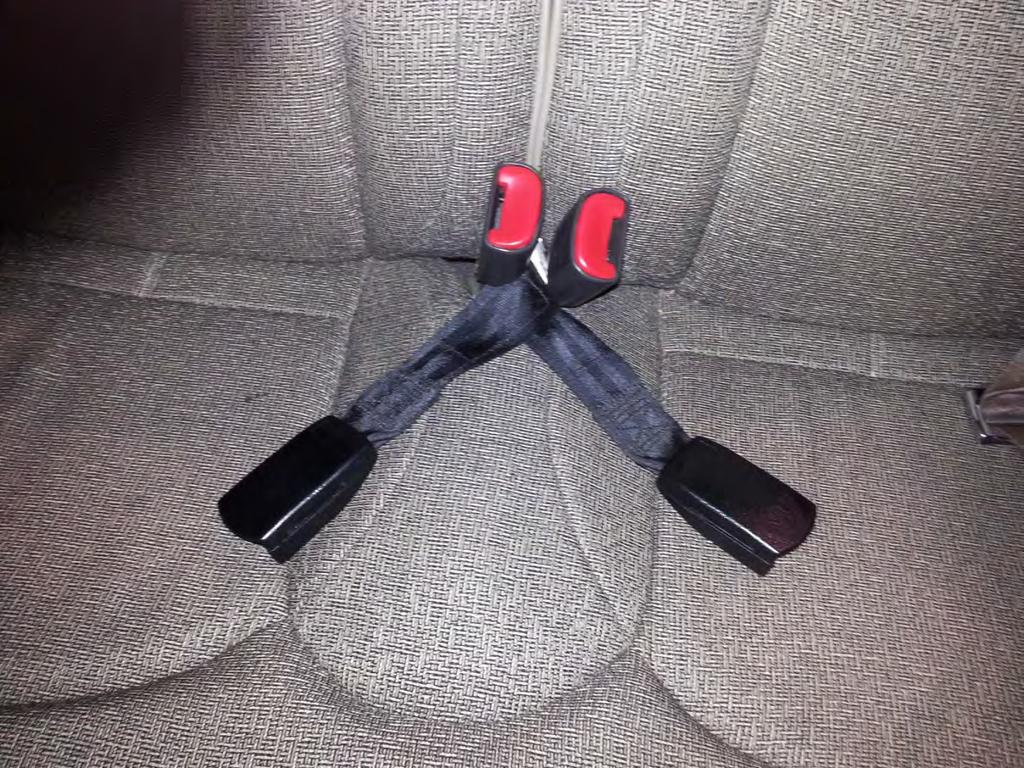 Activates airbag system, Do not use these. This picture shows the seat belt receptacles in the rear seat.
