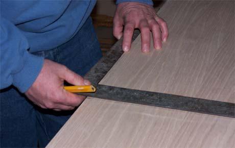 Using your carpenter square draw a line 11" up at a perfect right angle and stop.