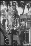 Photo by Joe Sia Courtesy of Big House Museum Archives Duane Allman performs at an outdoor concert in Jacksonville, FL with the band he founded - The Allman Brothers