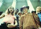 The original line-up of the Allman Brothers Band poses for a promo photo at 315 College Street, Macon, GA in Spring 1969, soon