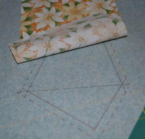 Assembly Instructions Set stitching length to 1.5 for all foundation stitching. Cut the Stitch-N-Tear Lite into 8-1/2 pieces across the width of the roll. Six pieces are needed for the three blocks.