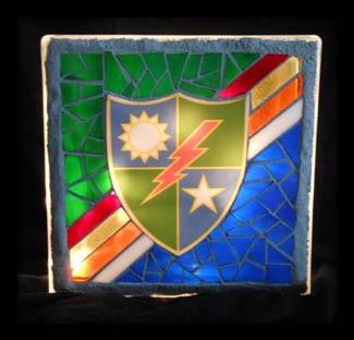 8 Glass block with glass mosaic on the front.