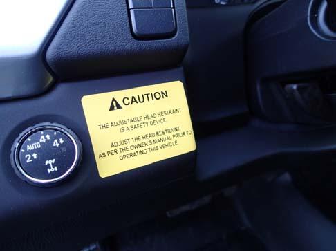 Attach additional Safety labels to the door of the forward compartment.