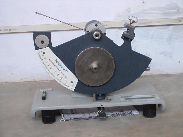 A knitted sample distorts under a tensile test and therefore a bursting strength test is appropriate for such fabrics. A bursting strength tester is shown in fig. 15.14.