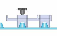 reconnect upper and lower to the desired belt type gauge block. Calibrating the gauge: 1. Unfasten the knob and place the gauge blocks on two adjacent belt teeth.