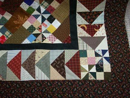 You might find it better to sew with the quilt center against the feed dogs to easy in any weight or fullness from the edge being cut on the bias.