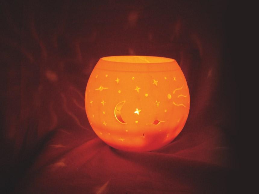 Honeypot Luminaries Carved Honeypot luminaries are spectacular beeswax globes with natural dried botanicals embedded in the shell.