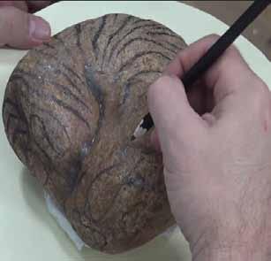 If you are going to create a Tiger on your stone, it s a good idea to watch the accompanying video to see the steps on how to draw the face