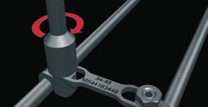 The Transverse link stability and rigidity are achieved with compression through tightening of the lateral lock nut.