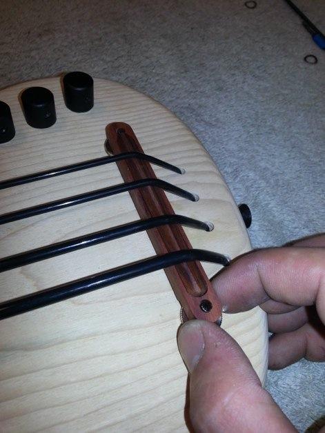 File a little at a time, and check the height periodically to prevent from filing to deep. 60. Once you ve finished filing you can check your string height at the 12th fret.