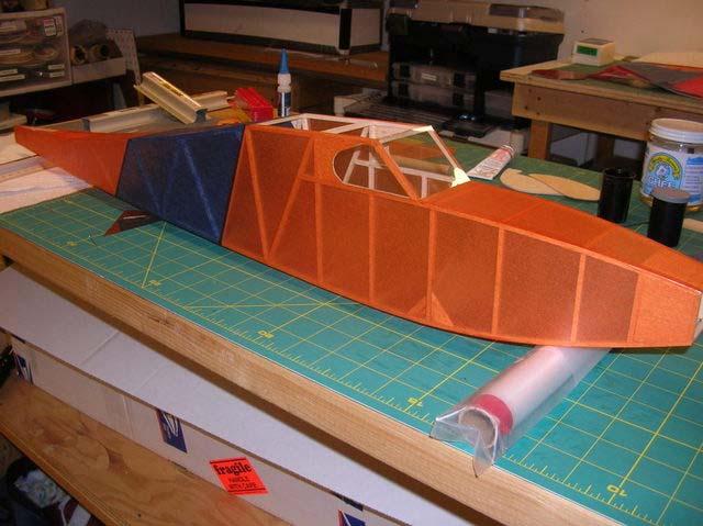 A covered fuselage ready for some trim! The main variant on applying tissue over Mylar is to brush the dope onto the bare mylar.