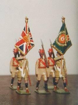 A close-up of the Colours of The King's African Rifles made by Kenn Jackson. The ensigns are some of Mr Jackson's most talented conversions of various Britains figures.