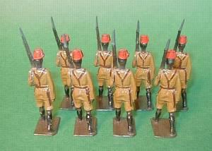 Britains No. 225: King's African Rifles.... but seen from behind - with their Y-shaped straps - the equipment are similar to the basic German type.