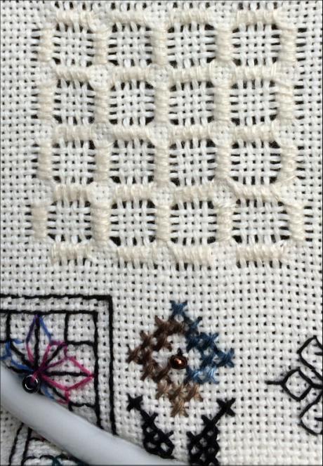 12,ecru Method: Step satin stitch is worked diagonally over 4 threads. Row 1 move from left to right, working 5 stitches pulling each stitch tight.