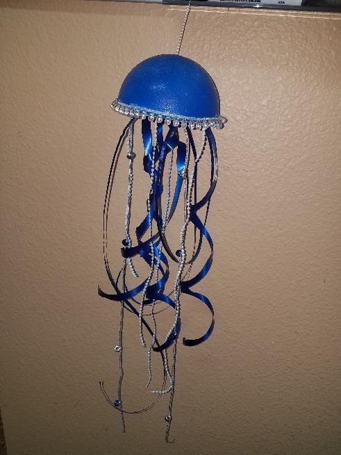 Jellyfish Ornament: Supplies: ½ Styrofoam ball Ribbon and beads Cardboard
