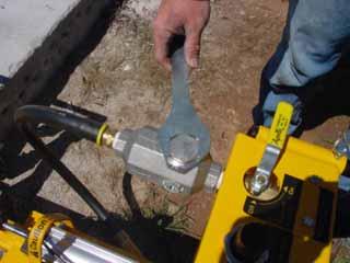 Power lever to the On position) Using the wrench provided on the back of the control panel,