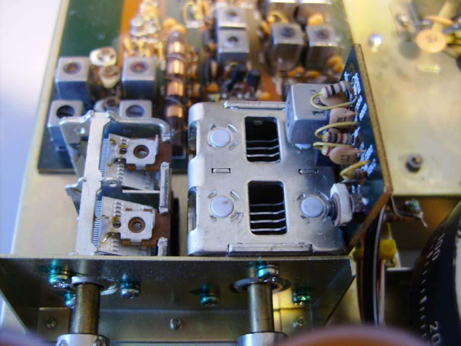 Photo 3. Two tuning capacitors of different systems with a common ground (mounting bracket). What s occurring is this situation?