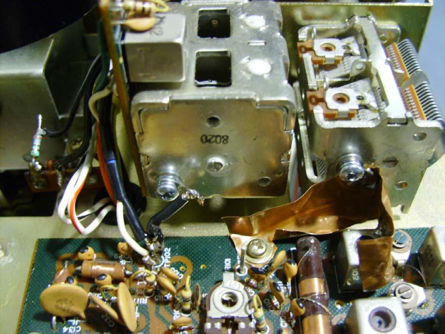 The interference is at its maximum when the preselector is not tuned, and when VC1 has been adjusted at its maximum capacitance. In that case, the current I from the 98.