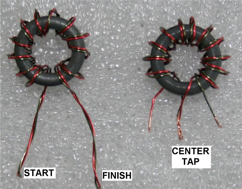 9. As shown in Figure 2, solder a piece of white wire to the plated through hole coming from the SO-239 connector (RF Input) and route it down through the standoff in the center of the toroid. 10.