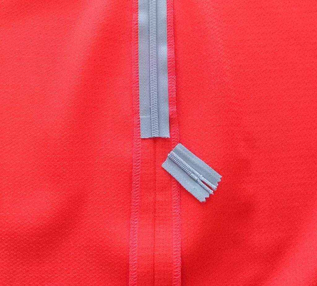 Remove Excess Zipper Tape If you have used a zipper that is longer than the opening, simply cut off the excess portion.