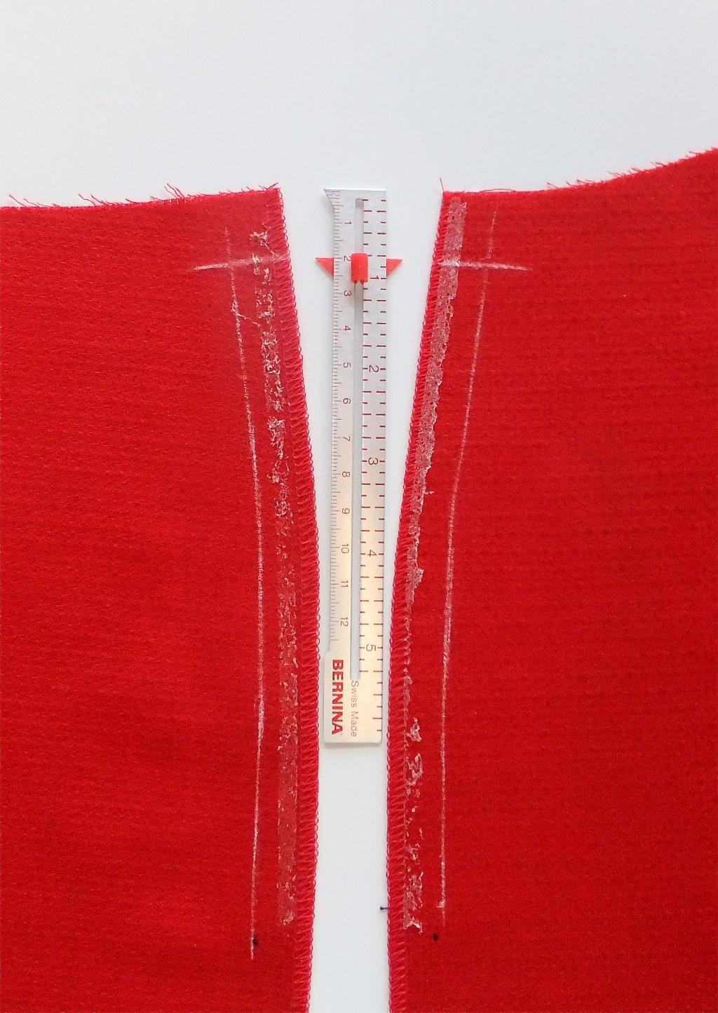 Mark Seamlines Using a chalk marker, mark the 5/8 seamline the length of the zipper opening on the RIGHT side of the fabric. Also mark a horizontal line 3/4 down from the top of the garment.