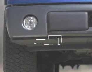 STEP 3. IF THE VEHICLE IS NOT EQUIPPED WITH FACTORY TOW HOOKS, USE THE SUPPLIED TEMPLATE AS A GUIDE TO MODIFY THE LOWER BUMPER VALANCE. ALIGN THE TEMPLATE WITH THE EDGES AS SHOWN.