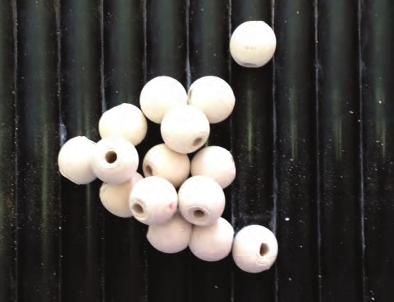 You may wish to smooth with a slightly wet sponge when they are bone dry. If you wish to fire for more permanent beads.
