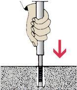 7. Now, take the setting tool and insert it into the anchor. Strike the setting tool with the hammer until the lip of the anchor touches the lip of the setting tool.
