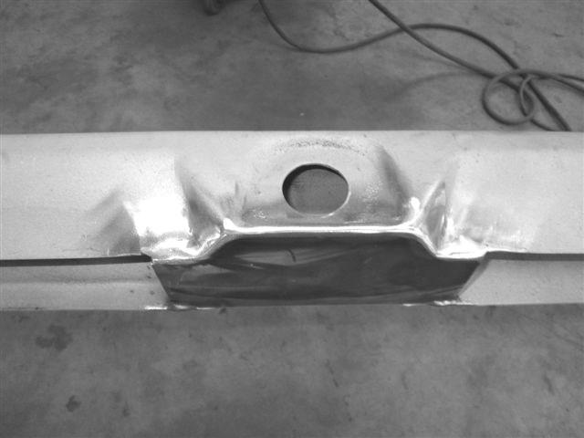 side. Do NOT add any more weld to bottom of backing plate.