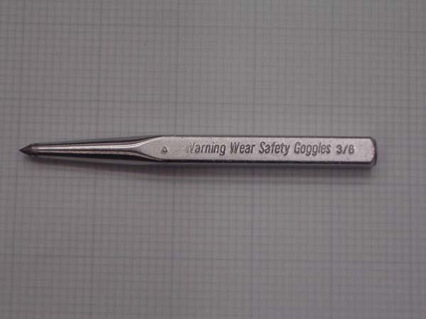 d. A center punch is used to make a dimple in the metal at the exact center of a hole.