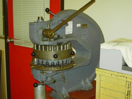 The turret punch contains sizes from 5 / 32 inch to well over 1 ½ inches in diameter. b.