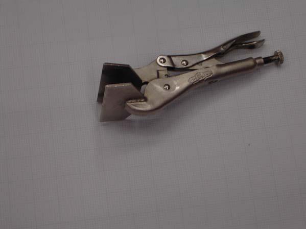 Locking pliers ("Vise Grips") come in several different form factors for different purposes.
