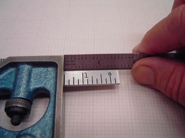 e. The way around that is to set the square with the decimal inch steel ruler for the desired length.
