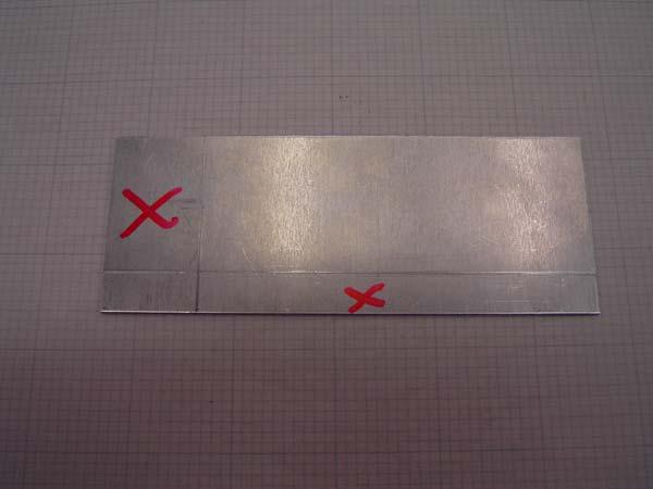 b. If you are doing very precise work and need to keep the surface of the metal as smooth as possible, you can use machinist's bluing on the metal, scribing only through the bluing and not on the