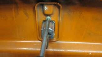 412. Remove the hood lock/latch