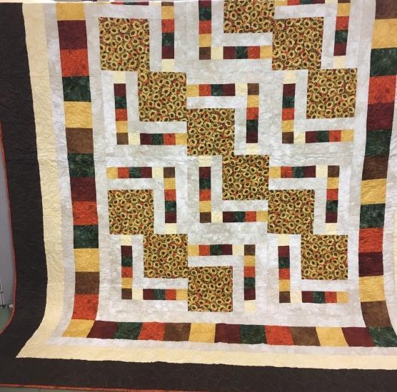 Quilt 5 Fall Sunflower King. This King Size Quilt was inspired by a picture Barb Berg saw on facebook.