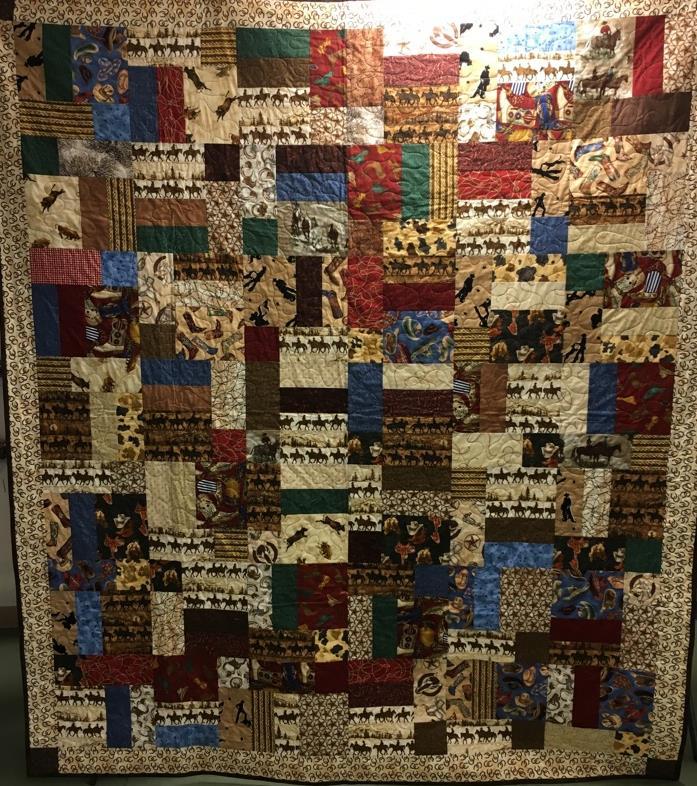 The 90" x 106" Queen Size Quilt was quilted by