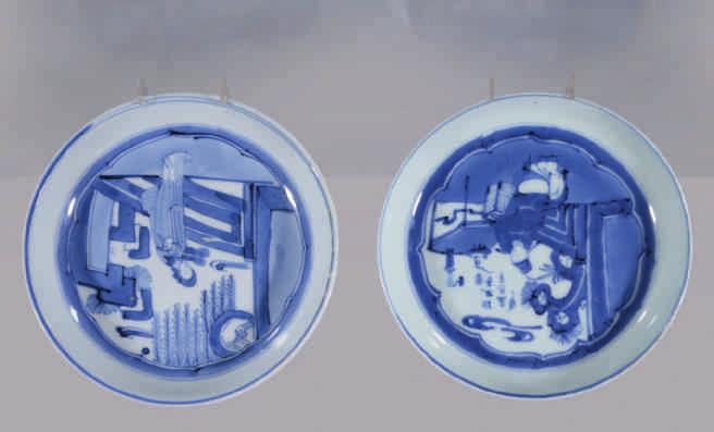 31. A Chinese blue and white saucer dish, painted with a man holding a scroll, 7 7 /8" diameter 32.