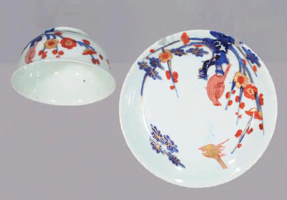 90. A Vauxhall tea bowl and saucer, painted in underglaze blue, iron red and gilt in Chinese Imari style with birds perched on rockwork and in flight, and flowering branches, circa 1760-64, no