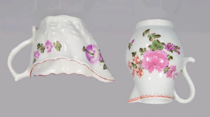 A Lowestoft Low Chelsea Ewer cream boat, painted in coloured enamels in Tulip Painter style with three sprays of flowers and leaves, beneath a brown line rim, 4" long, circa 1770-75, no mark 92.