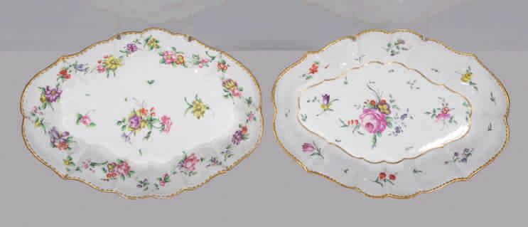 103. A Bristol fluted lozenge shaped dish, finely painted in coloured enamels with sprays of flowers and leaves, and scattered flowers, the border painted with flower garlands, within a gilt dentil