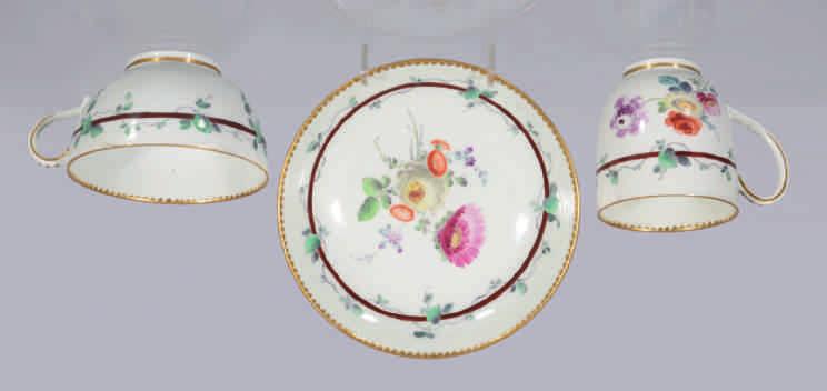 A Worcester plate, finely painted in coloured enamels in the London atelier of James Giles with a central cluster of fruits, the fluted border with fruits, a butterfly and three insects, gilt line