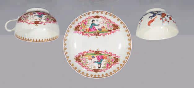 130. A Worcester saucer, finely painted in coloured enamels in the London atelier of James Giles with exotic birds perched on rockwork, within gilt cartouches, and smaller mirror shaped panels of