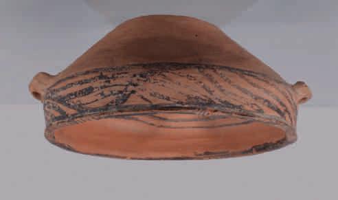 1. A Chinese Neolithic pottery two handled bowl, painted